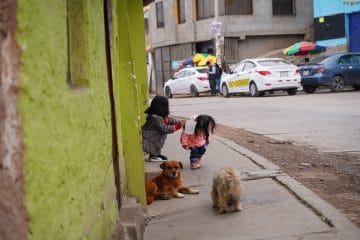 Children in Peru are often left to play in the street while parents work teaching children in peru how to help keep themselves safe when left alone while parents work"