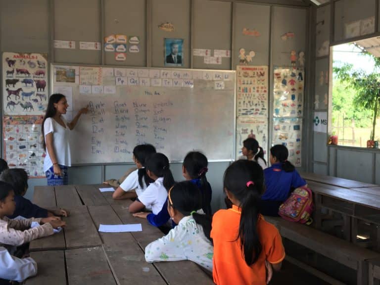 Volunteer teaching an English class at Helping Hands in Cambodia