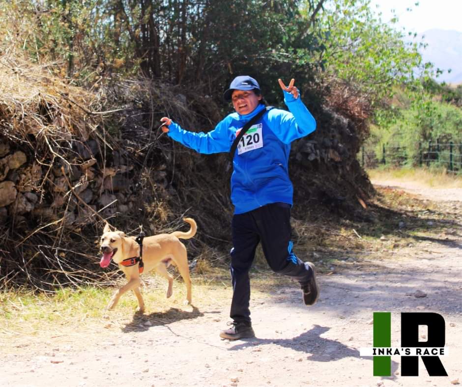 Runner and dog during the race Runner and dog"