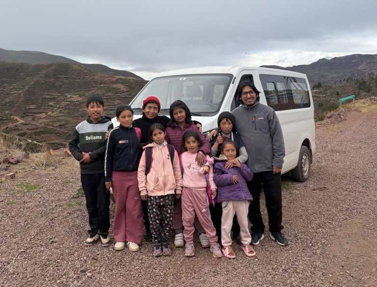 Mobile Library teachers and children by the van