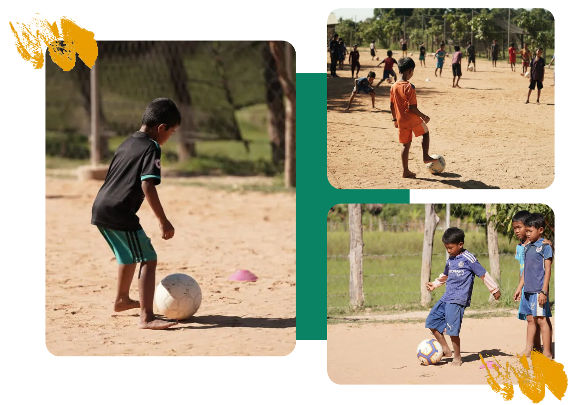 Children playing football on a dusty village pitch in rural Siem Reap Children playing football on a dusty village pitch in rural Siem Reap