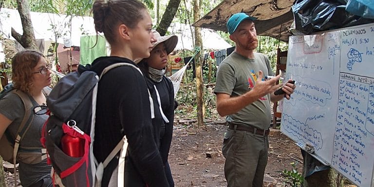 Volunteers at a morning briefing at the research centre