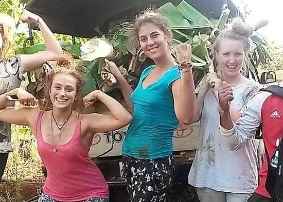 Volunteers at elephant sanctuary in Thailand"