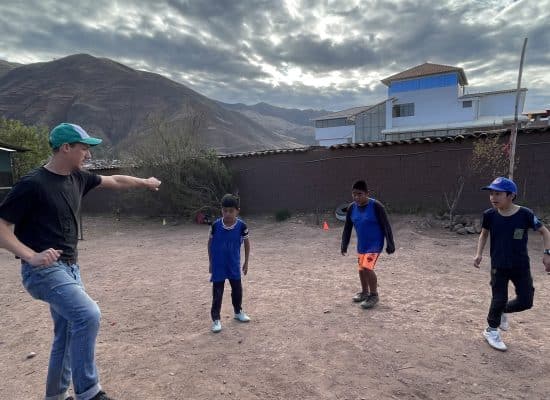 Florian playing football with the children at Picaflor"