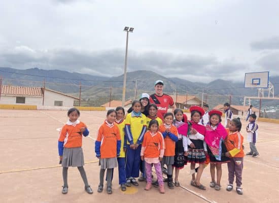 Larissa and Florian with students"
