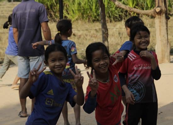 kids posing for camera"