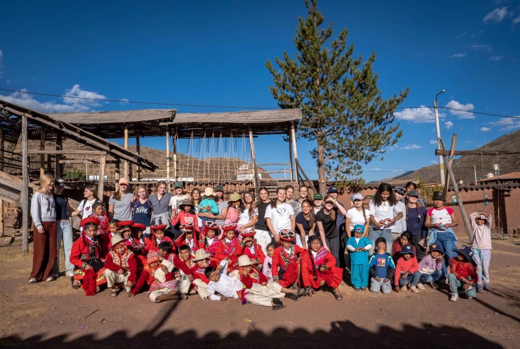 The Piper’s Corner school group with the children and staff at Picaflor House