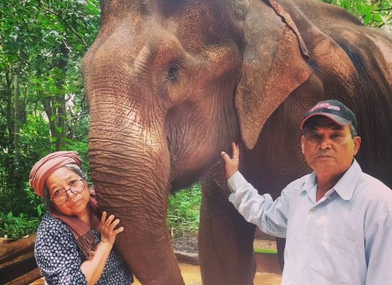 Local Cambodians with an elephant"
