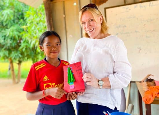 Volunteer with student in Siem Reap"