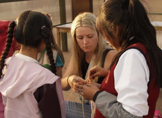 Volunteer with the children abroad"