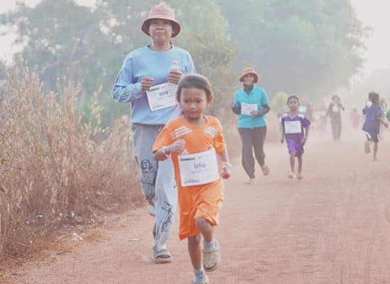 Hope in every stride children of all ages running together"
