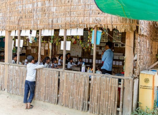 Young students learning in a classroom at Helping Hands Cambodia"