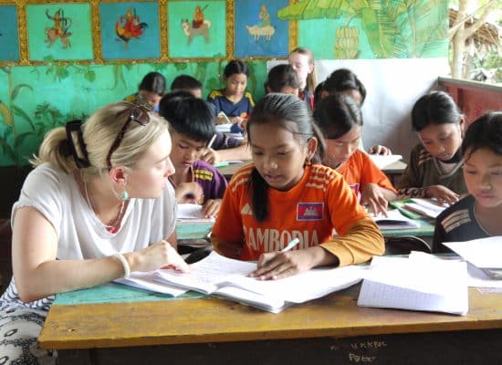 Volunteer in class in Cambodia"