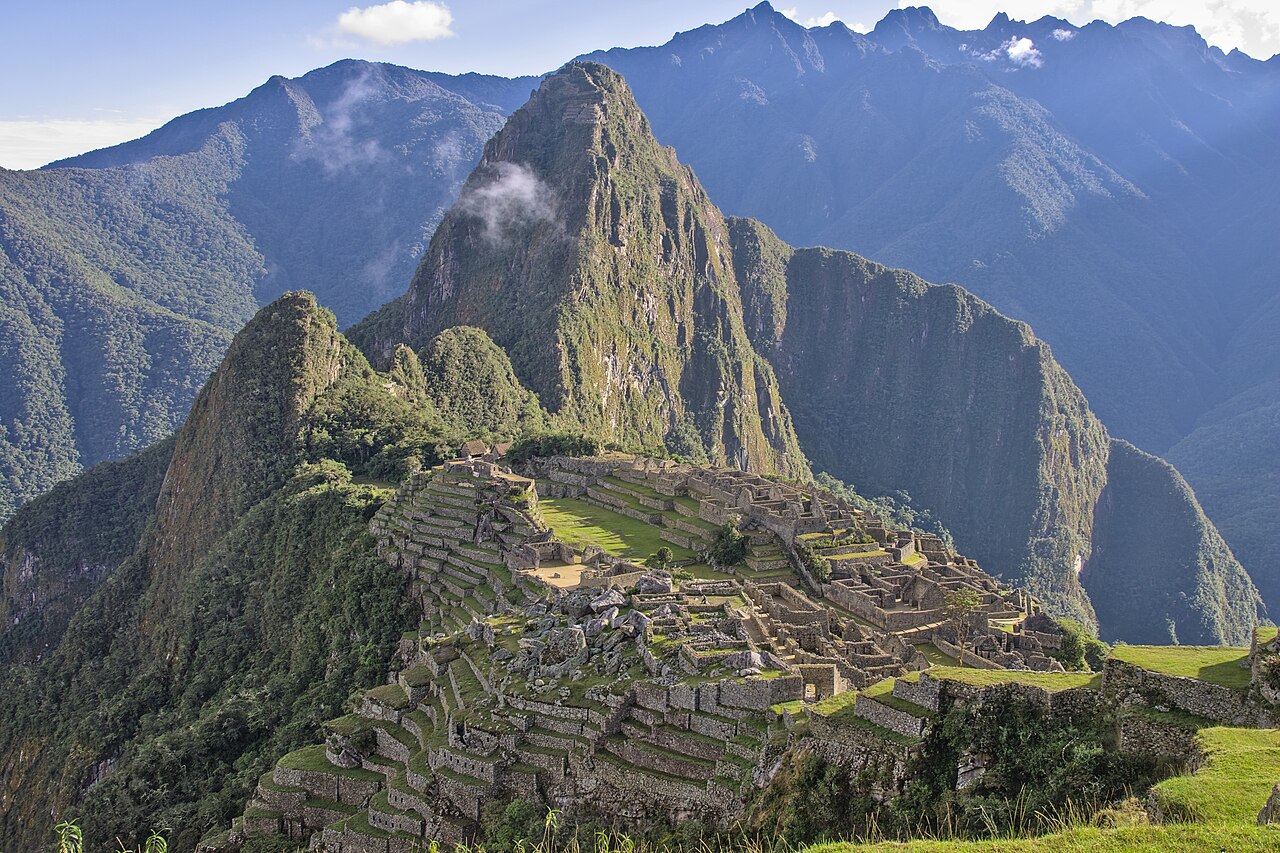 The ancient ruins of Machu Picchu with Huayna Picchu mountain behind