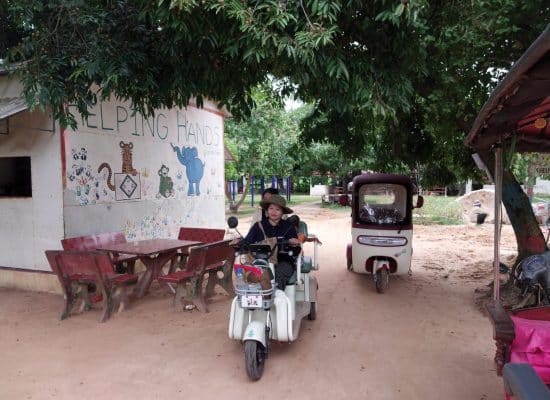 Electric tuk-tuk used for community health outreach at Helping Hands"