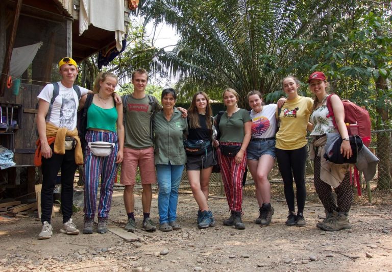 Volunteers and staff at the sanctuary A group of volunteers with a member of the sanctuary staff in the Peruvian Amazon