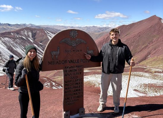 Two Globalteer volunteers at the Red Valley viewpoint on the Rainbow Mountain trip"