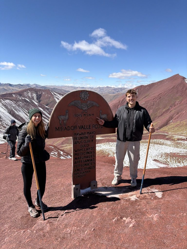Two Globalteer volunteers at the Red Valley viewpoint on the Rainbow Mountain trip